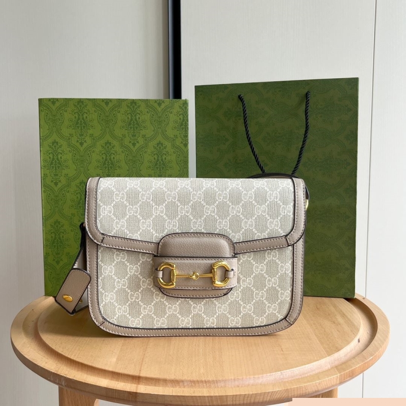 G*u*i satchel bags